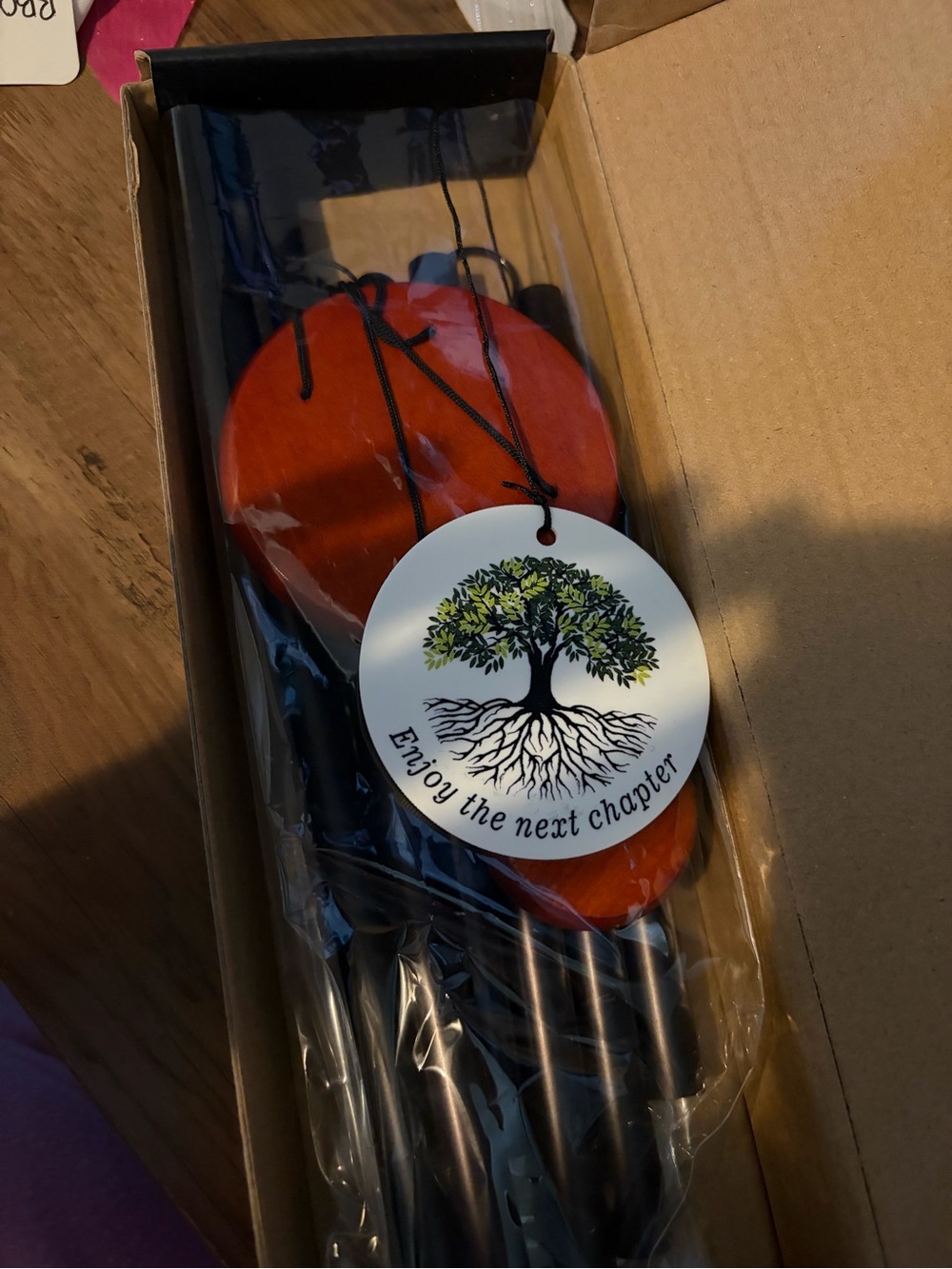 Enjoy The Next Chapter Orange and Black Wind Chime - Inspirational Tree Accent